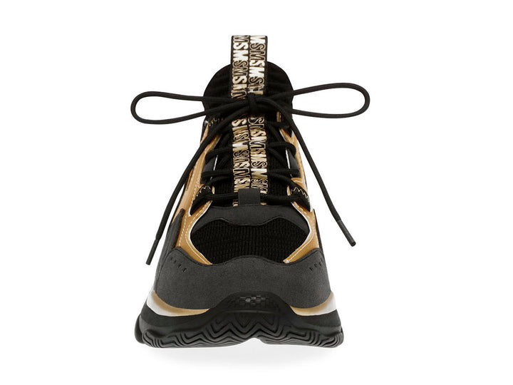 Tenis Steve Madden Match Box en color negro con detalles dorados y suela chunky robusta.