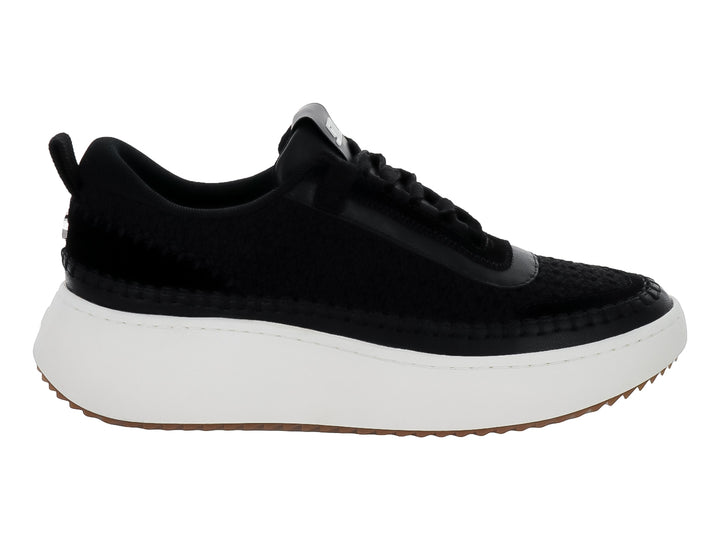 Tenis Steve Madden Double Take en color negro con suela blanca gruesa y base café.