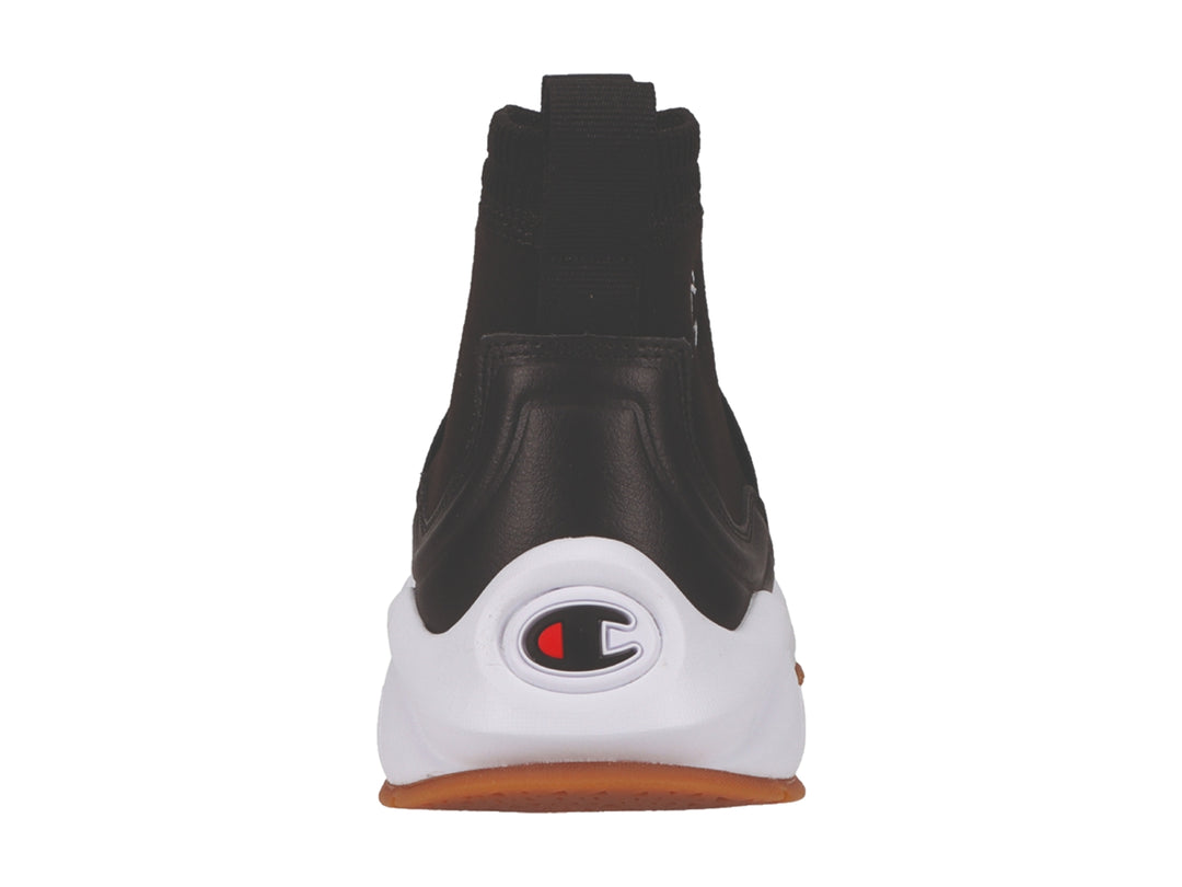Tenis deportivos Champion Rally Pro color negro con suela blanca y detalles dorados.