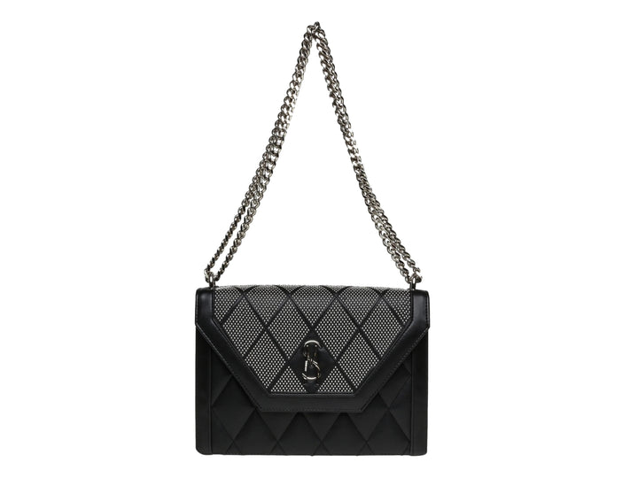 Bolso de hombro Steve Madden color negro y plata con textura acolchada y correa de cadena metálica.