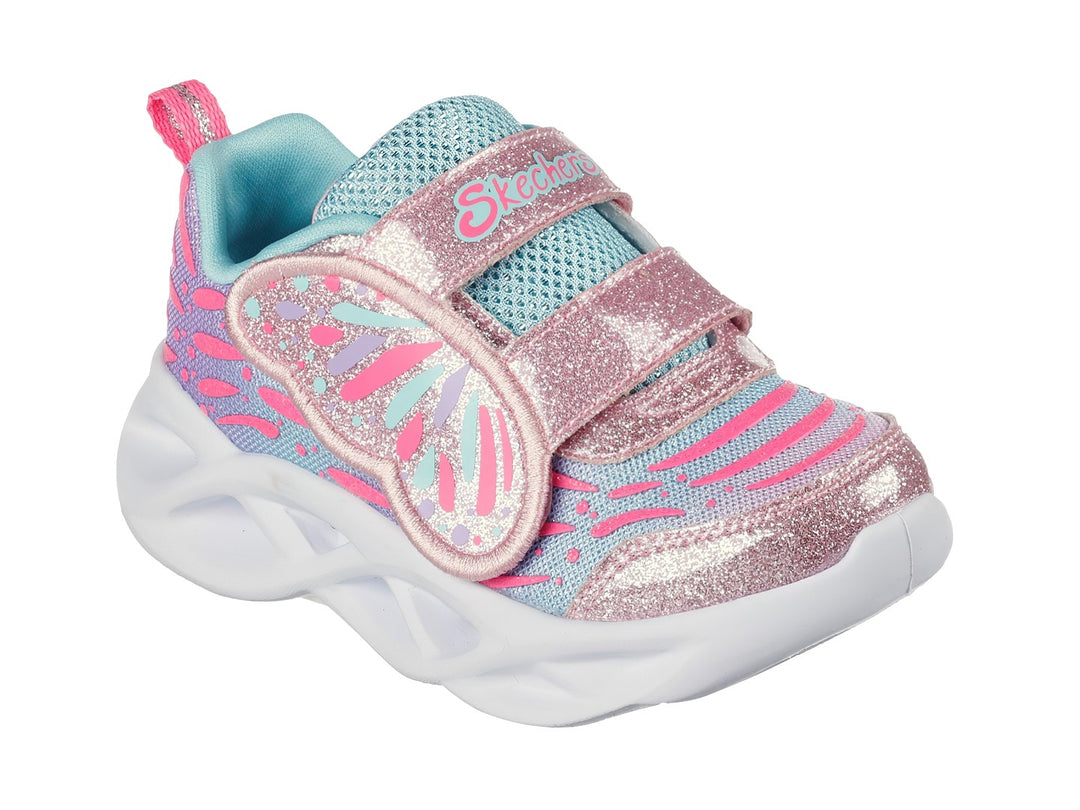 Tenis deportivos para niña en color rosa y turquesa con suela blanca y correas de velcro brillantes.