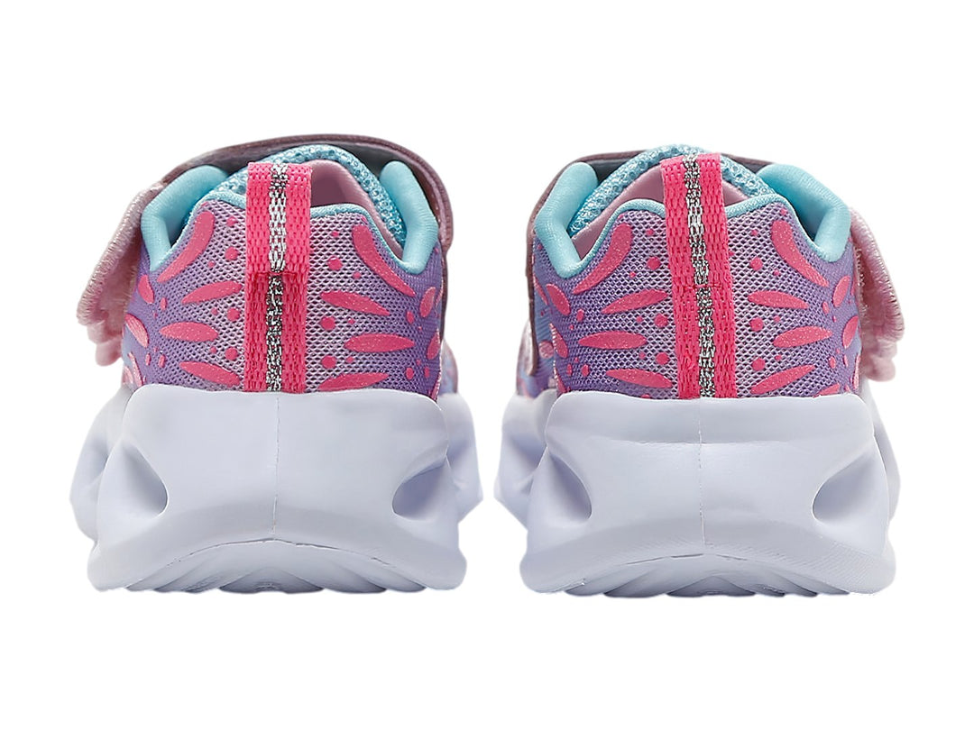 Tenis deportivos para niña en color rosa y turquesa con suela blanca y correas de velcro brillantes.