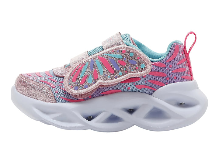 Tenis deportivos para niña en color rosa y turquesa con suela blanca y correas de velcro brillantes.