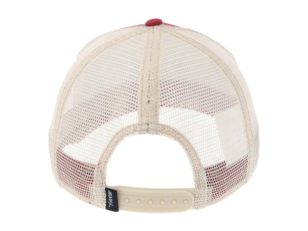Gorra roja Goorin Bros con parche frontal bordado de un perro y el texto Bad Boy.