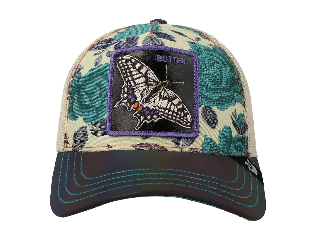 Gorra Goorin Bros con estampado de rosas verdes, visera negra y un parche central de una mariposa morada.