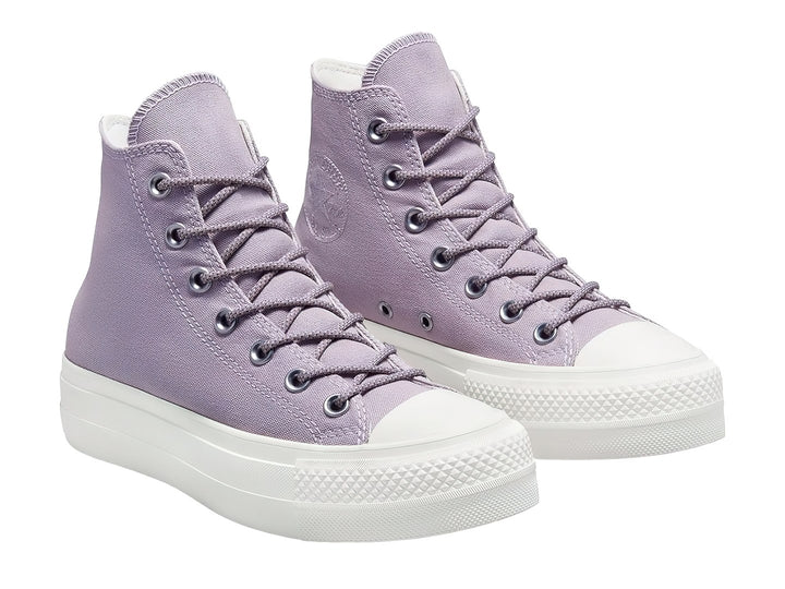 Tenis Converse Chuck Taylor All Star Lift HI de color lila con suela de plataforma blanca.