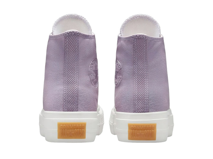 Tenis Converse Chuck Taylor All Star Lift HI de color lila con suela de plataforma blanca.