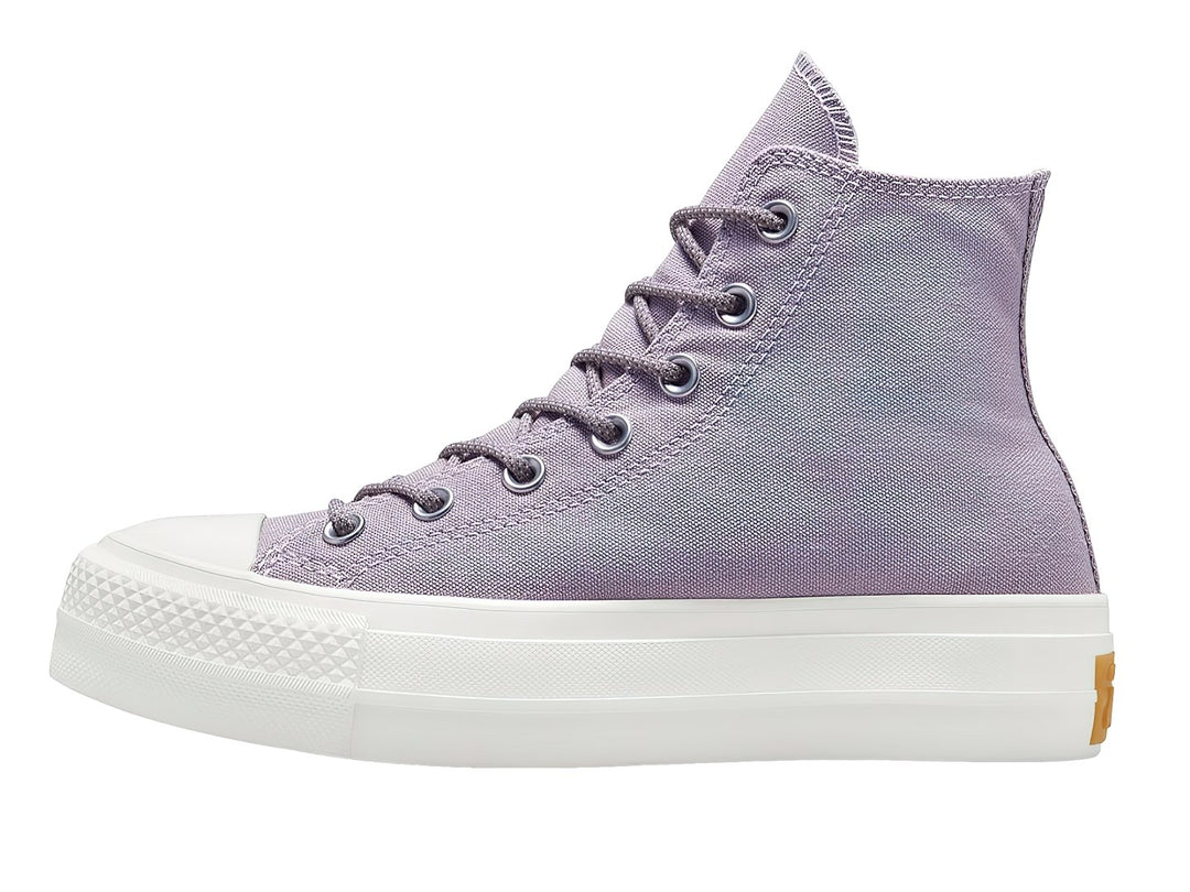 Tenis Converse Chuck Taylor All Star Lift HI de color lila con suela de plataforma blanca.