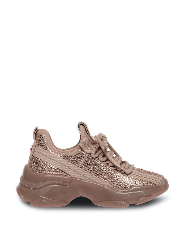 Tenis infantiles Steve Madden color rose gold con acabado brillante y suela gruesa.