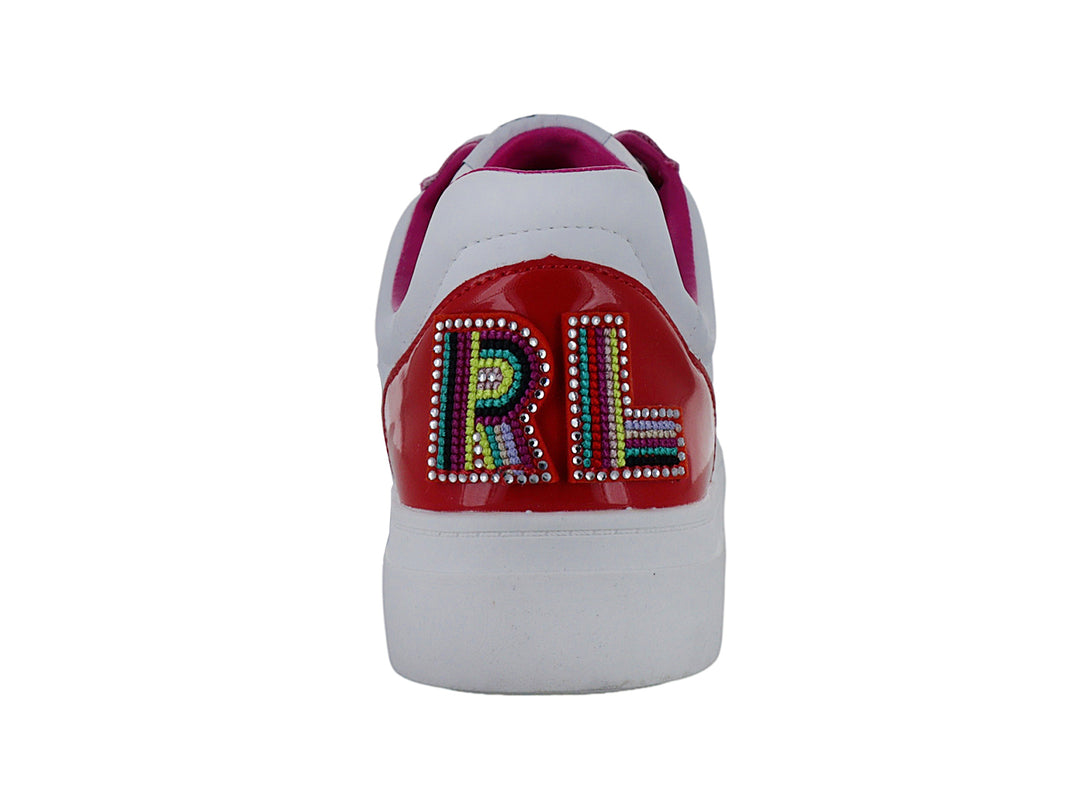 Tenis blancos con detalles en rosa brillante y punta beige de la marca Karl Lagerfeld.