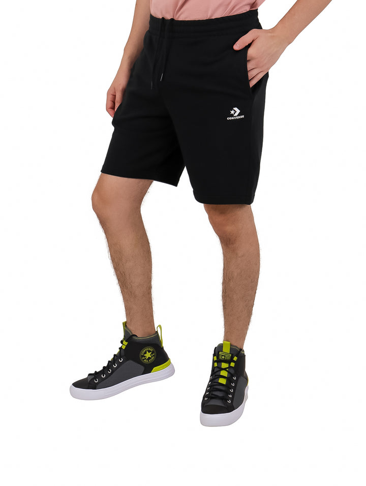 Bermudas negras de la marca Converse con cintura elástica y cordón ajustable, estilo deportivo.