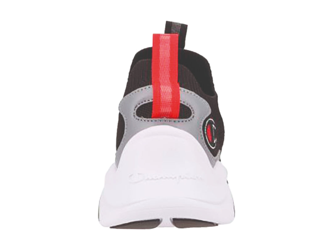Tenis deportivos Champion en colores negro, gris y blanco con detalles rojos y suela blanca robusta.