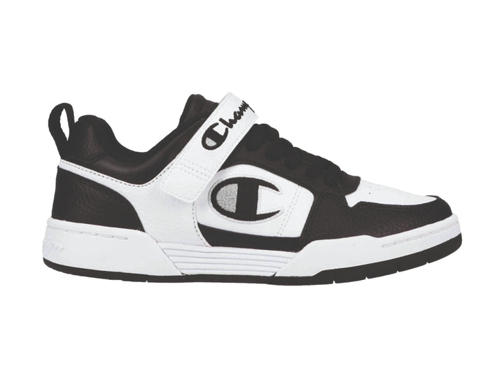 Tenis deportivos Champion Arena Power Lo en colores blanco y negro con correa ajustable.