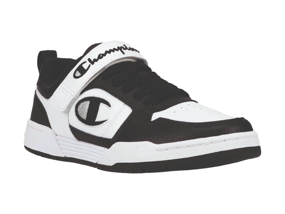 Tenis deportivos Champion Arena Power Lo en colores blanco y negro con correa ajustable.