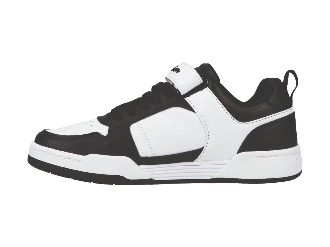 Tenis deportivos Champion Arena Power Lo en colores blanco y negro con correa ajustable.