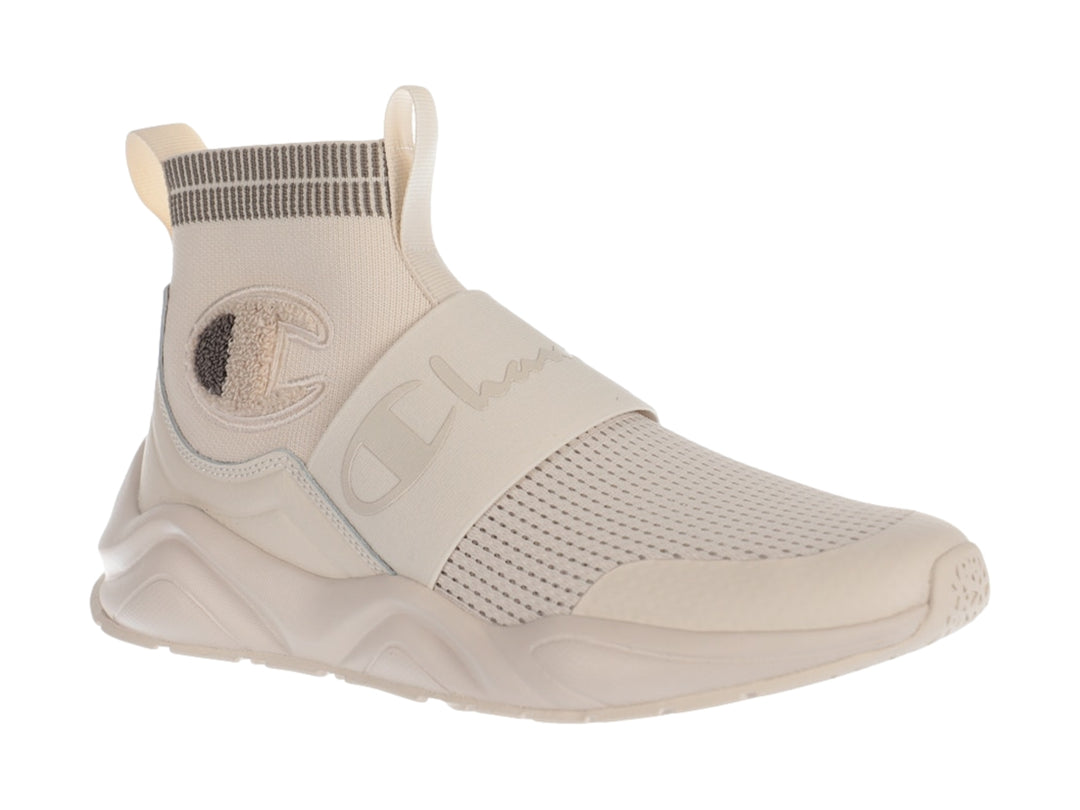 Tenis Champion Rally Pro color beige flood, diseño slip-on con tejido y suela robusta.