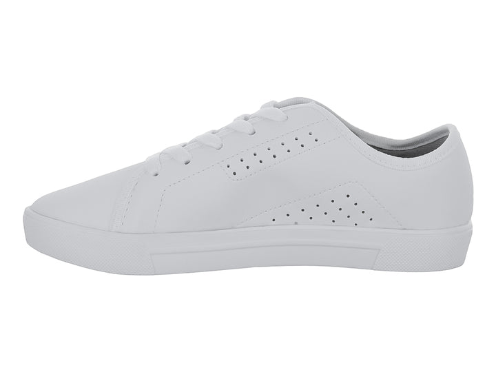 Tenis blancos casuales para niño de la marca Molekinho con detalles perforados y suela blanca.
