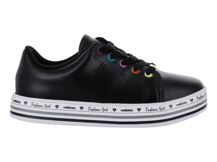 Tenis negros de la marca Molekinha con suela blanca decorada y ojillos de colores para Niña.