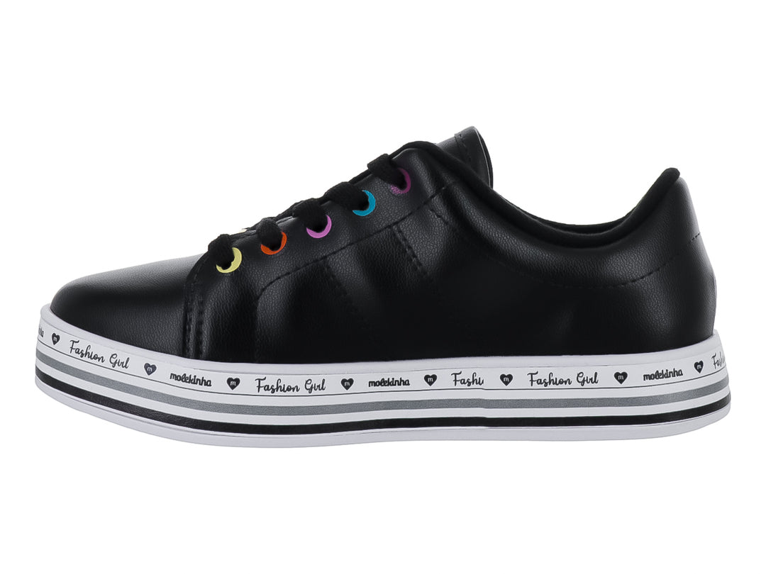 Tenis negros de la marca Molekinha con suela blanca decorada y ojillos de colores para Niña.