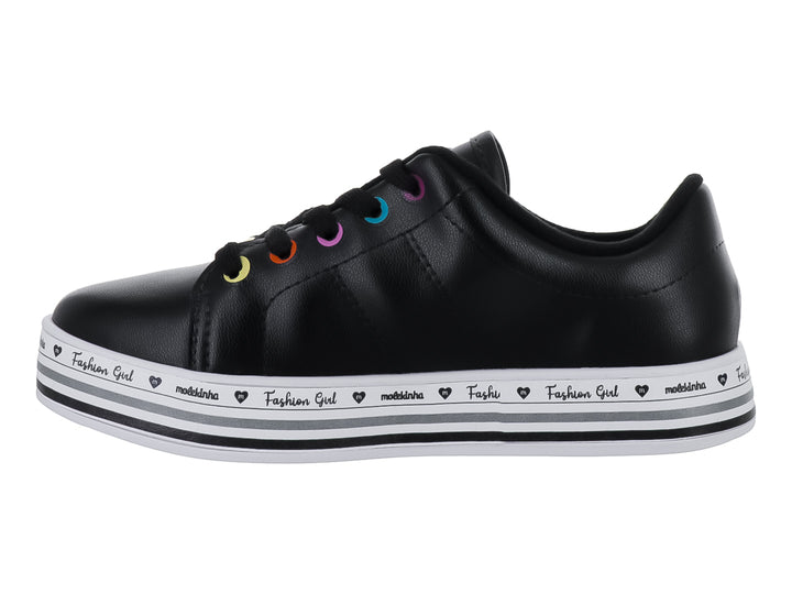 Tenis negros de la marca Molekinha con suela blanca decorada y ojillos de colores para Niña.