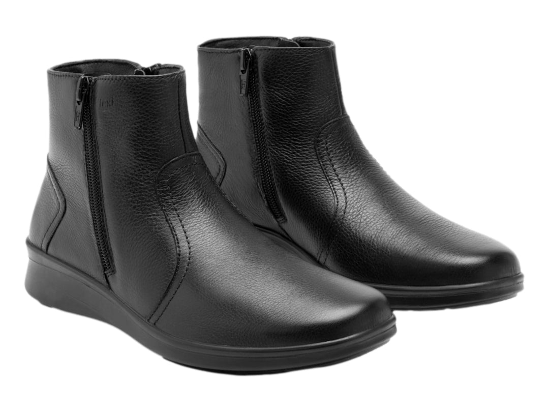 Botín Flexi de cuero negro para mujer con cierre lateral y suela plana negra.