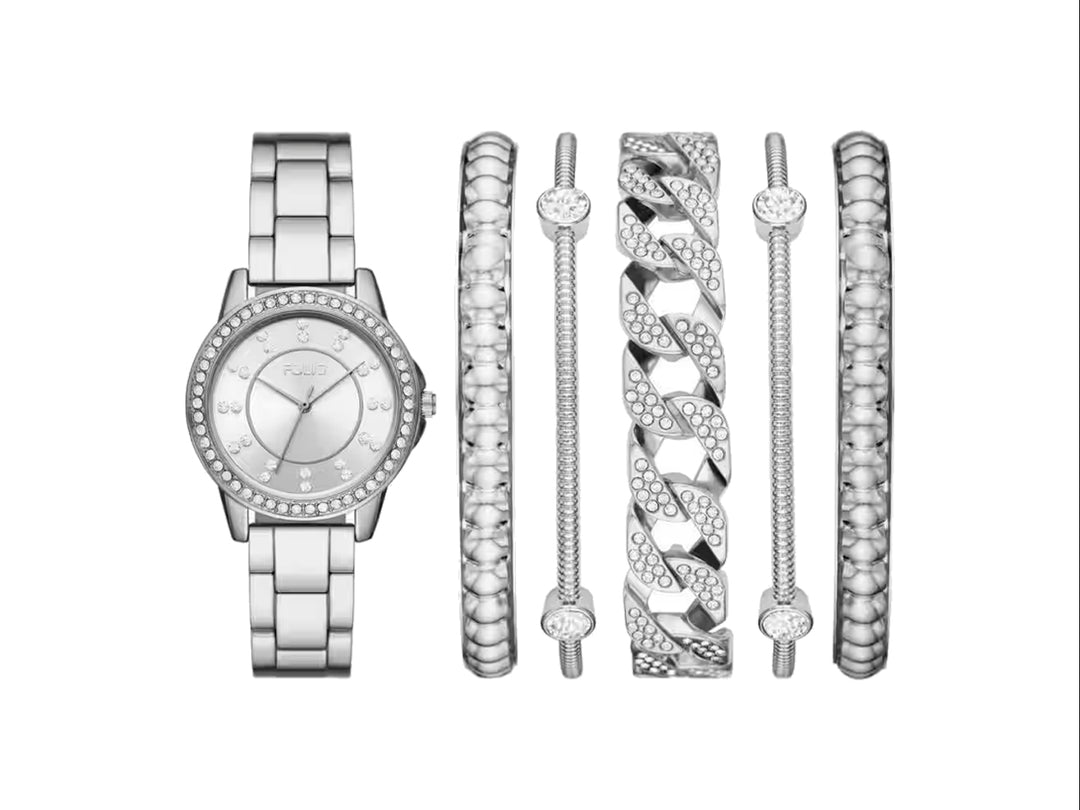 Set de joyería Folio color plata que incluye un reloj analógico y cinco pulseras coordinadas con detalles brillantes.