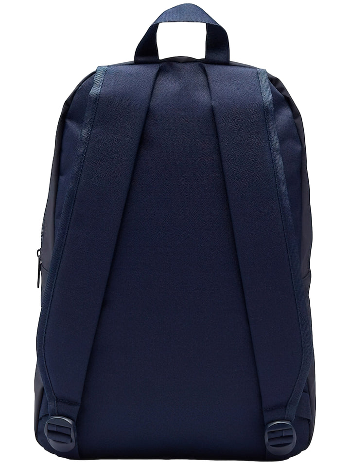 Mochila escolar Reebok color azul marino con logotipo frontal en blanco y rojo.