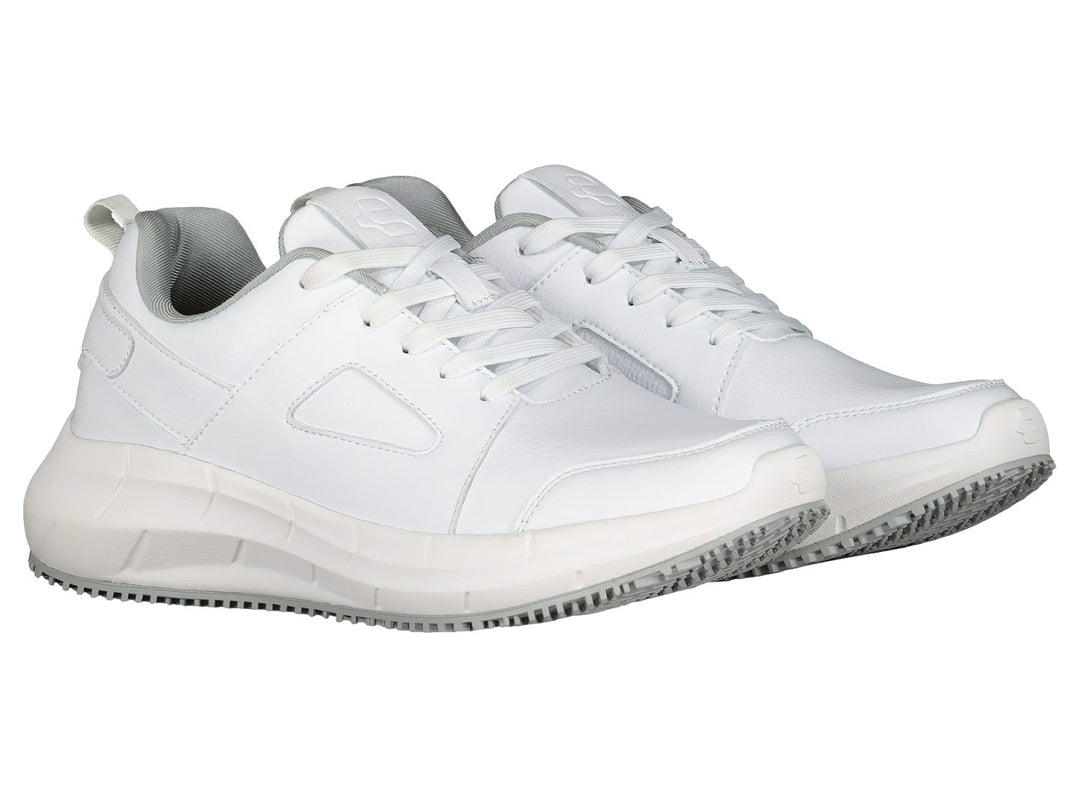 Par de tenis deportivos Charly color blanco con suela y forro interior en color gris.