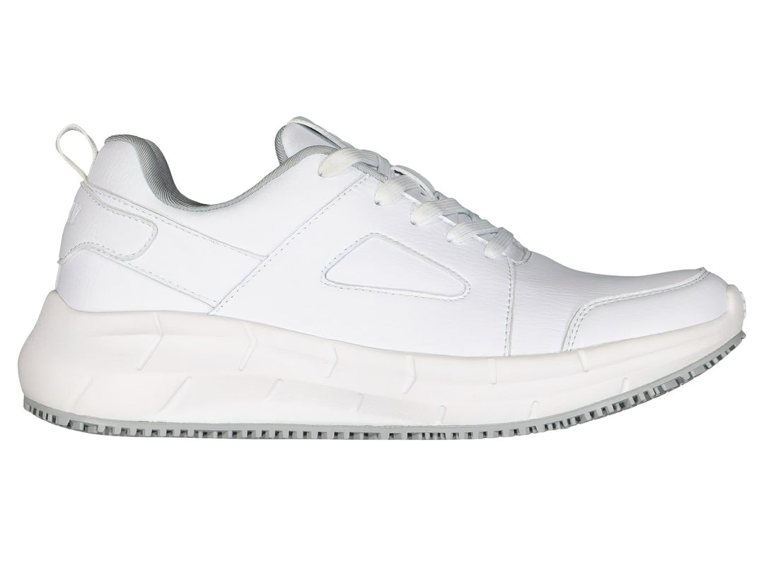 Par de tenis deportivos Charly color blanco con suela y forro interior en color gris.