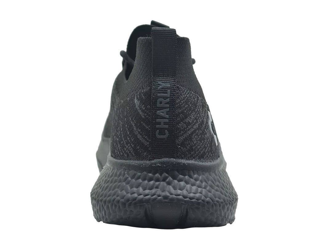 Tenis deportivos Charly color negro con tejido transpirable y suela sintética.