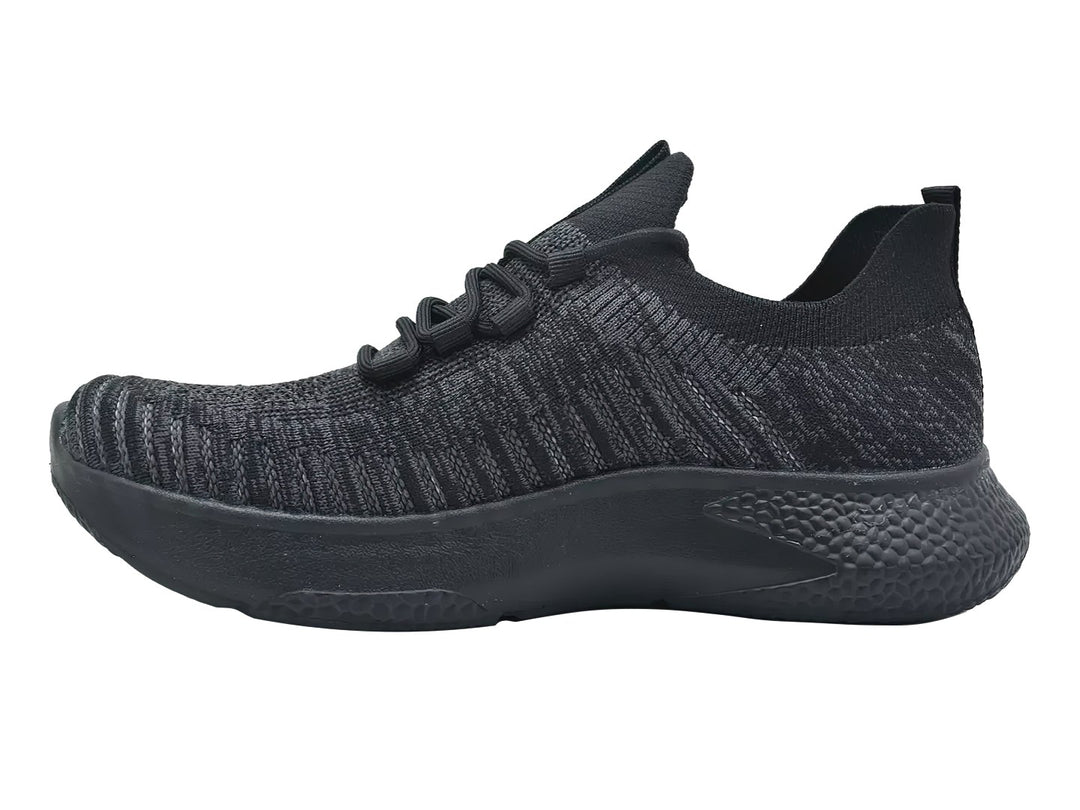 Tenis deportivos Charly color negro con tejido transpirable y suela sintética.