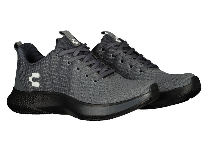 Tenis deportivos Charly color gris con suela negra y logotipo blanco lateral.