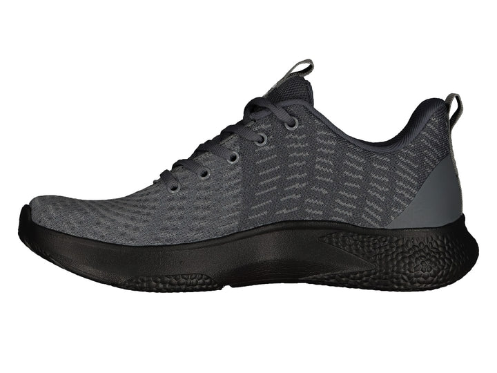 Tenis deportivos Charly color gris con suela negra y logotipo blanco lateral.