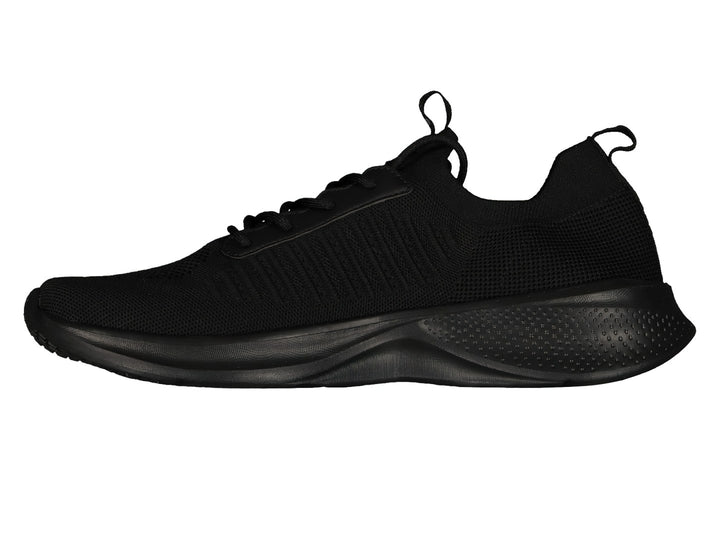 Par de tenis deportivos color negro con suela ligera y detalles en gris.