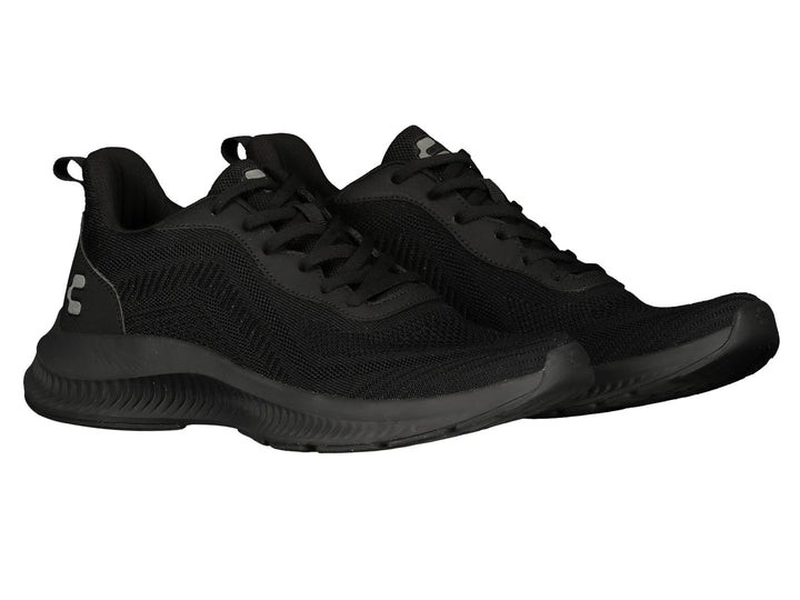 Par de tenis deportivos Charly en color negro con malla transpirable y suela gruesa.