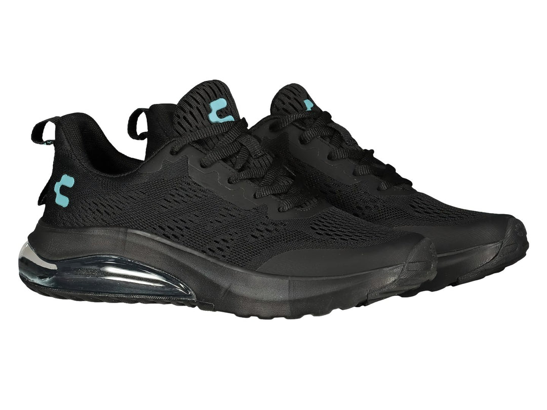 Tenis deportivos Charly color negro con detalles aqua y suela con cámara de aire transparente.
