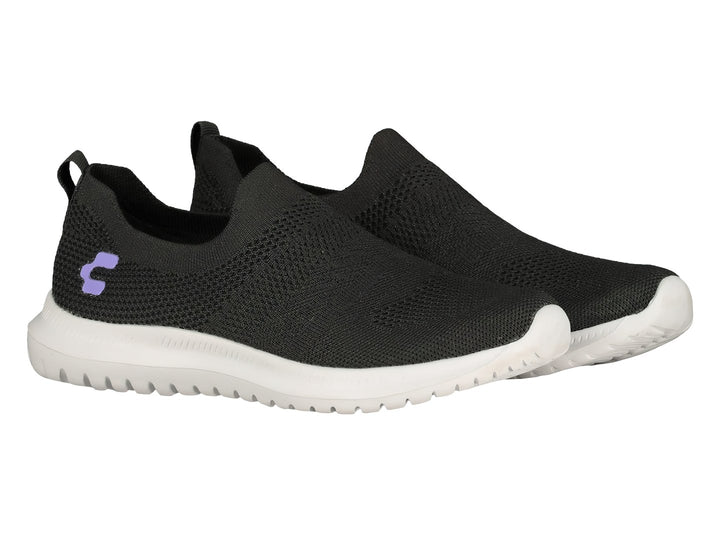 Tenis deportivos Charly color negro con suela blanca, diseño slip-on sin agujetas.