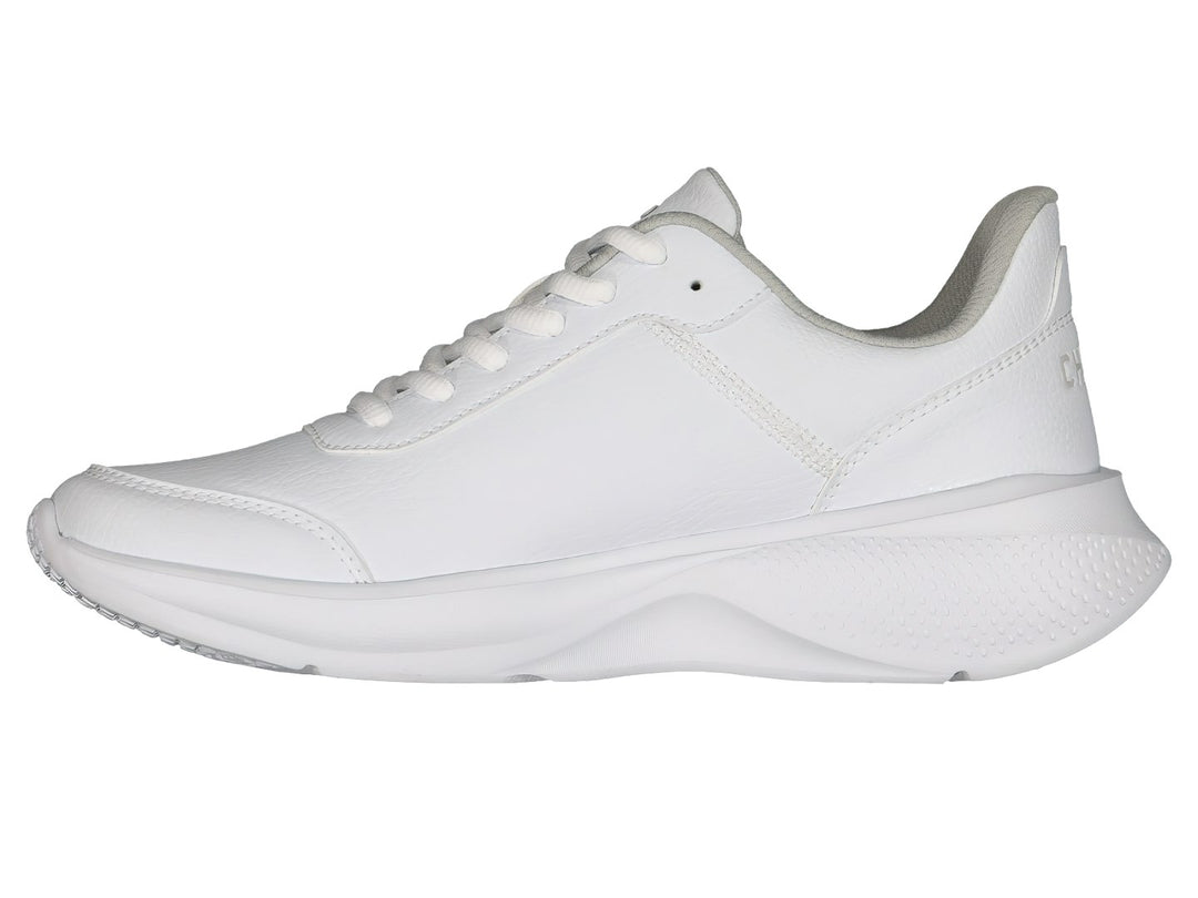 Par de tenis deportivos Charly color blanco con detalles en gris y suela blanca.