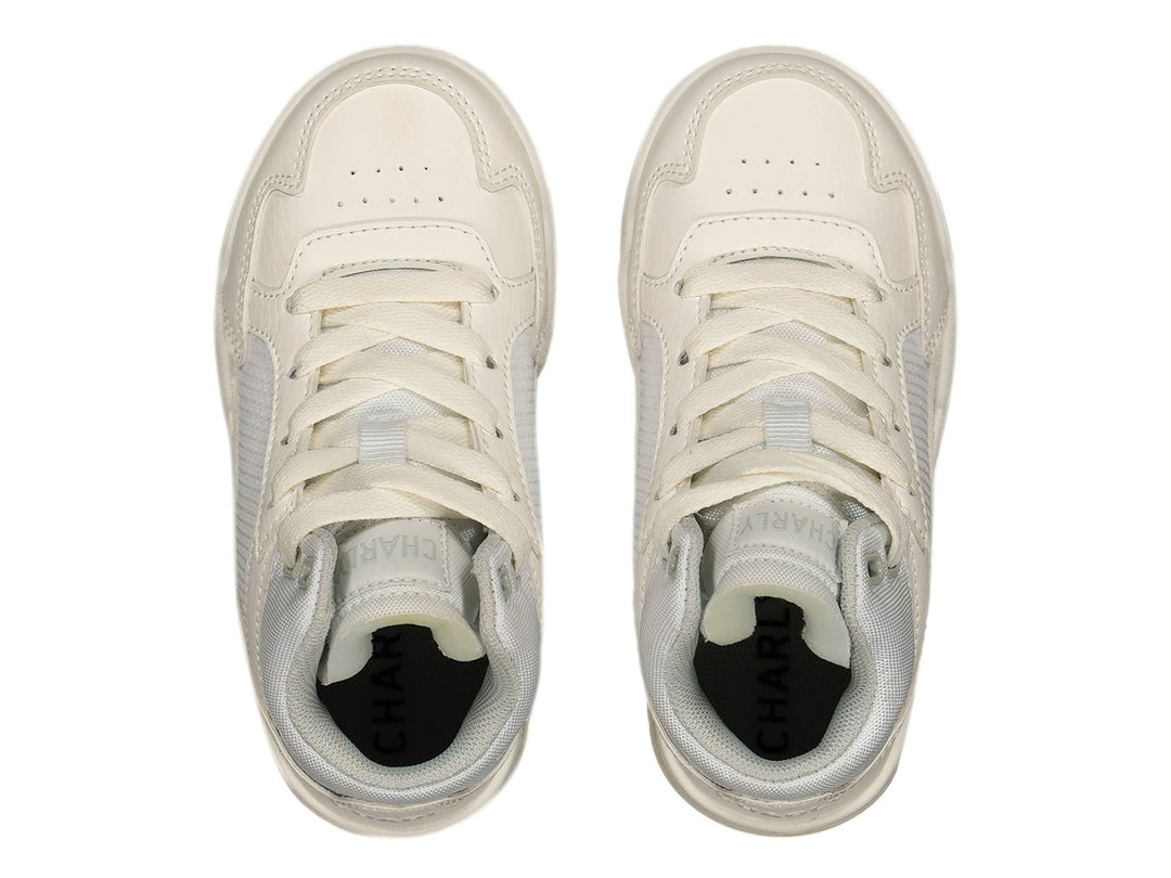 Tenis deportivos Charly color blanco con detalles de malla y suela con cámara de aire.