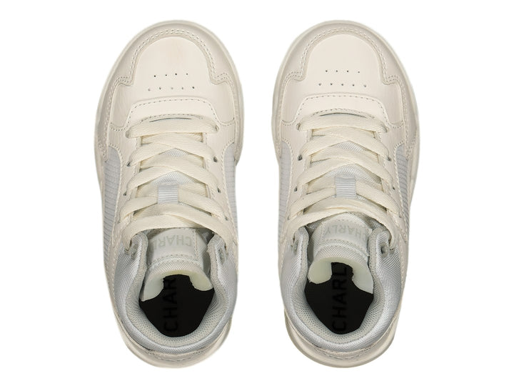 Tenis deportivos Charly color blanco con detalles de malla y suela con cámara de aire.