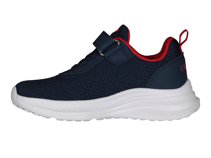 Tenis deportivos Charly color azul marino con suela blanca y detalles en rojo.