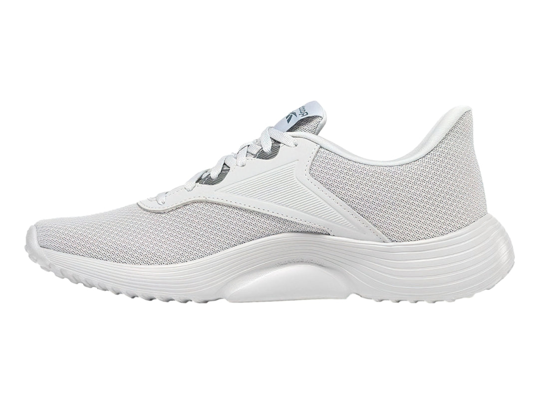 Tenis deportivos Reebok color gris con suela blanca y detalles en azul.