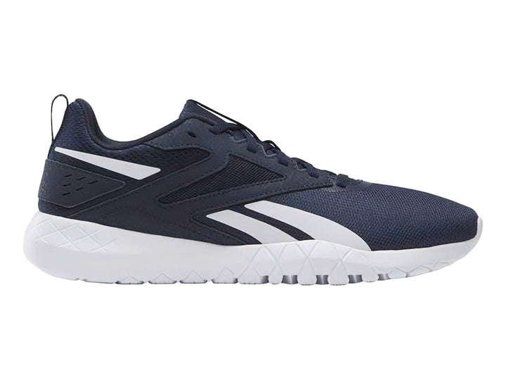 Tenis deportivos Reebok color azul marino con detalles y suela blanca.