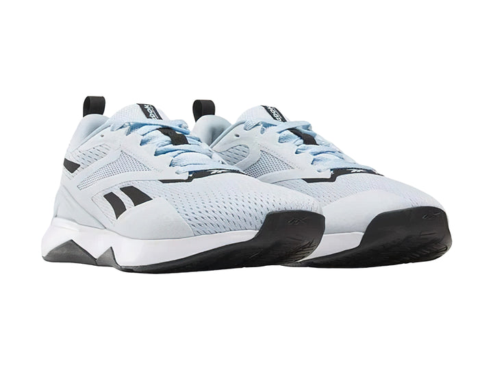 Tenis deportivos Reebok NanoFlex TR 2 en color azul claro con detalles en negro y suela blanca.