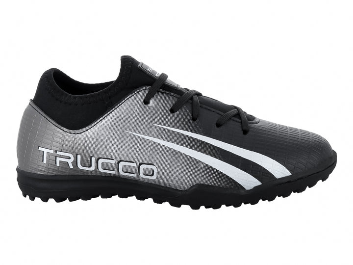Zapato de fútbol Leon Trucco en color negro y blanco con suela para pasto sintético.