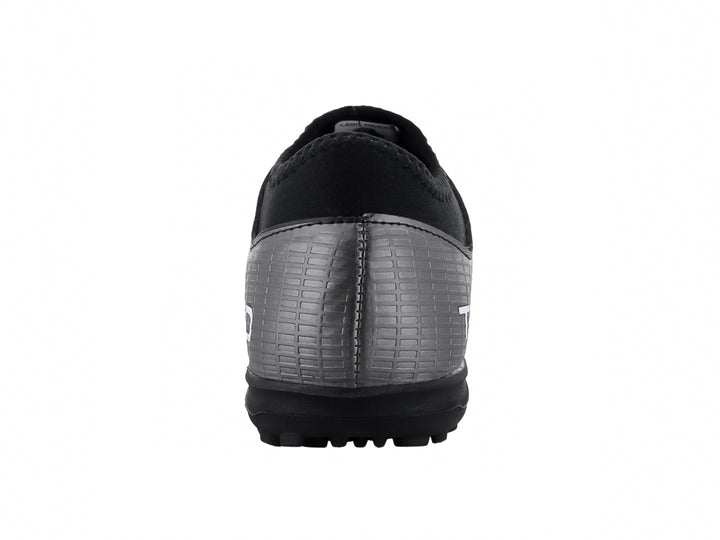 Zapato de fútbol Leon Trucco en color negro y blanco con suela para pasto sintético.