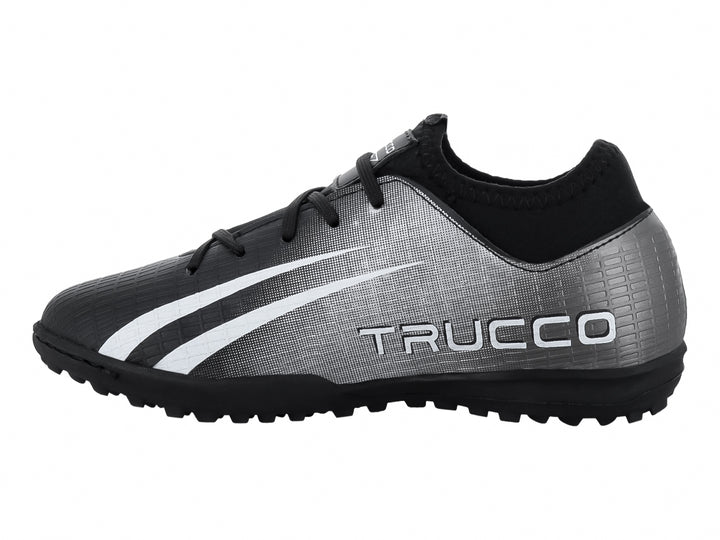 Zapato de fútbol Leon Trucco en color negro y blanco con suela para pasto sintético.