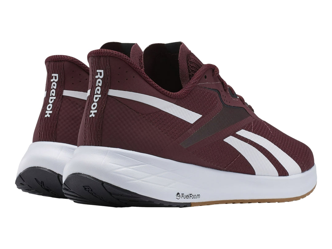 Tenis deportivos Reebok Energen Run 3 en color guinda con detalles en blanco y negro y suela blanca.