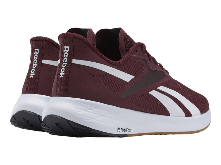 Tenis deportivos Reebok Energen Run 3 en color guinda con detalles en blanco y negro y suela blanca.
