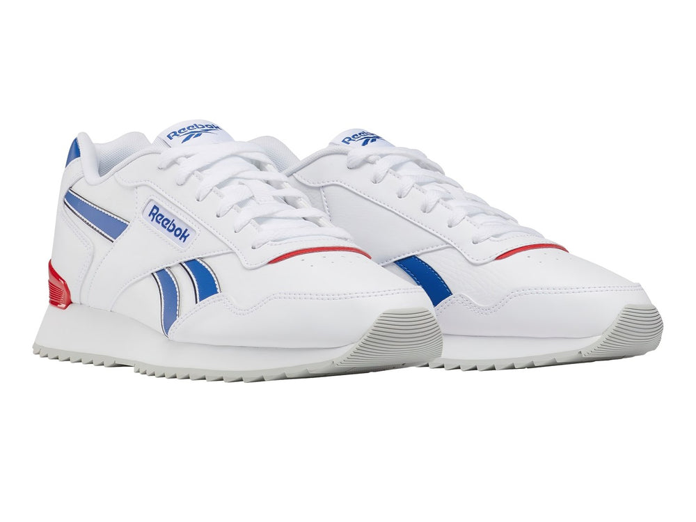 Tenis Reebok Glide Ripple Clip blancos con franjas azules y detalle rojo en el talón.